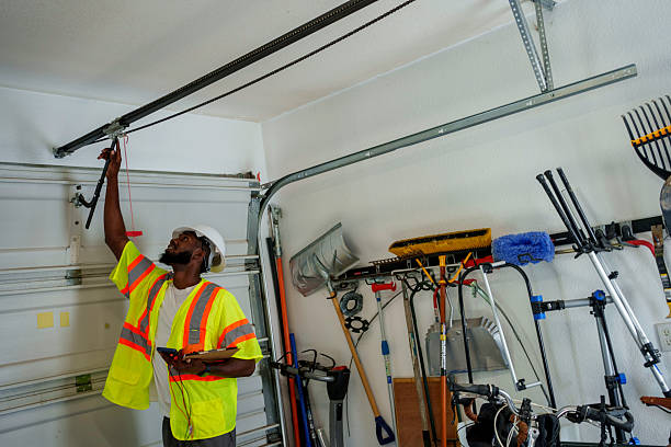 Professional Garage Door Panel Replacement technician working in Roanoke Rapids, NC